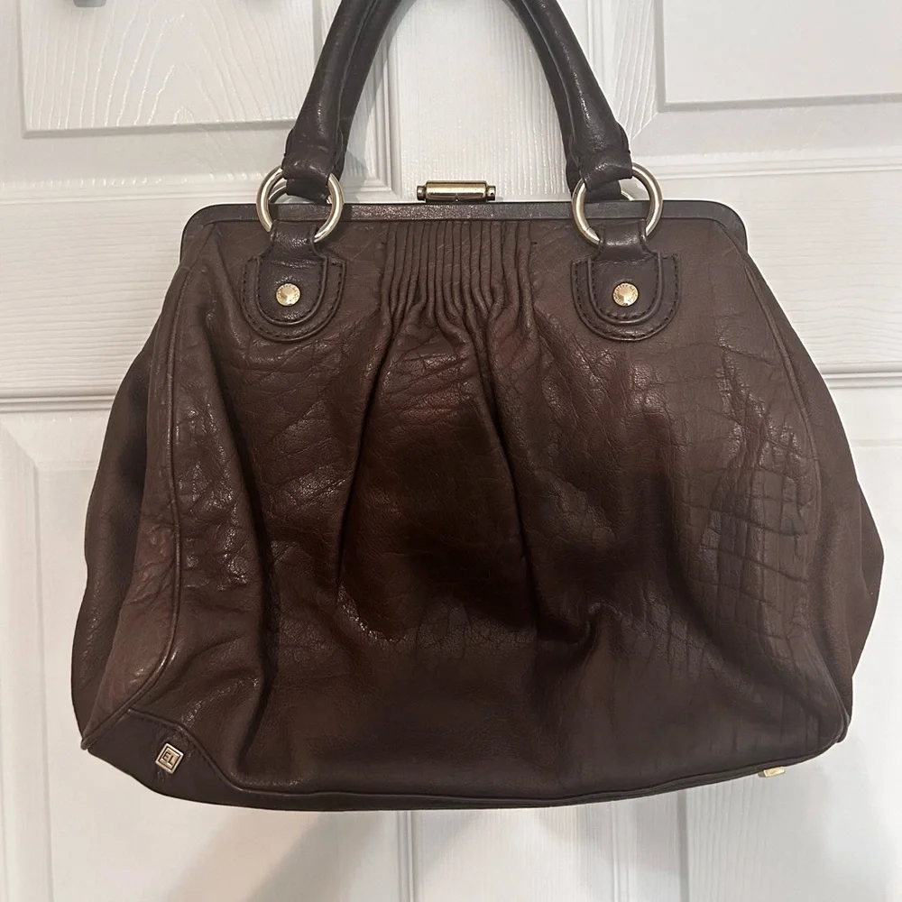 Elliott Lucca excellent used